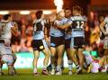 The Sharks celebrated success against the Dragons but face a tough three-week stretch. (HANDOUT/NRL PHOTOS)
