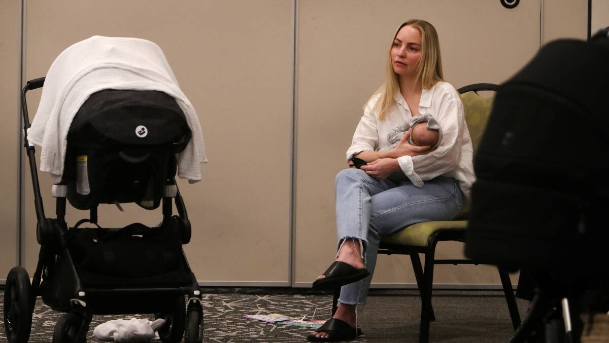 Dozens of women, some with their babies, attended the hearing. Picture by Sylvia Liber