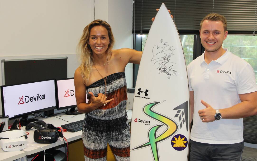 Riding the crest of a wave: Sally Fitzgibbons and Ken Kencevski at Devika's office in the SMART Infrastructure Facility at the University of Wollongong.

