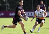 Josh Rogers (L) will fill in for Adam Reynolds at halfback for Brisbane against Parramatta. (Darren England/AAP PHOTOS)