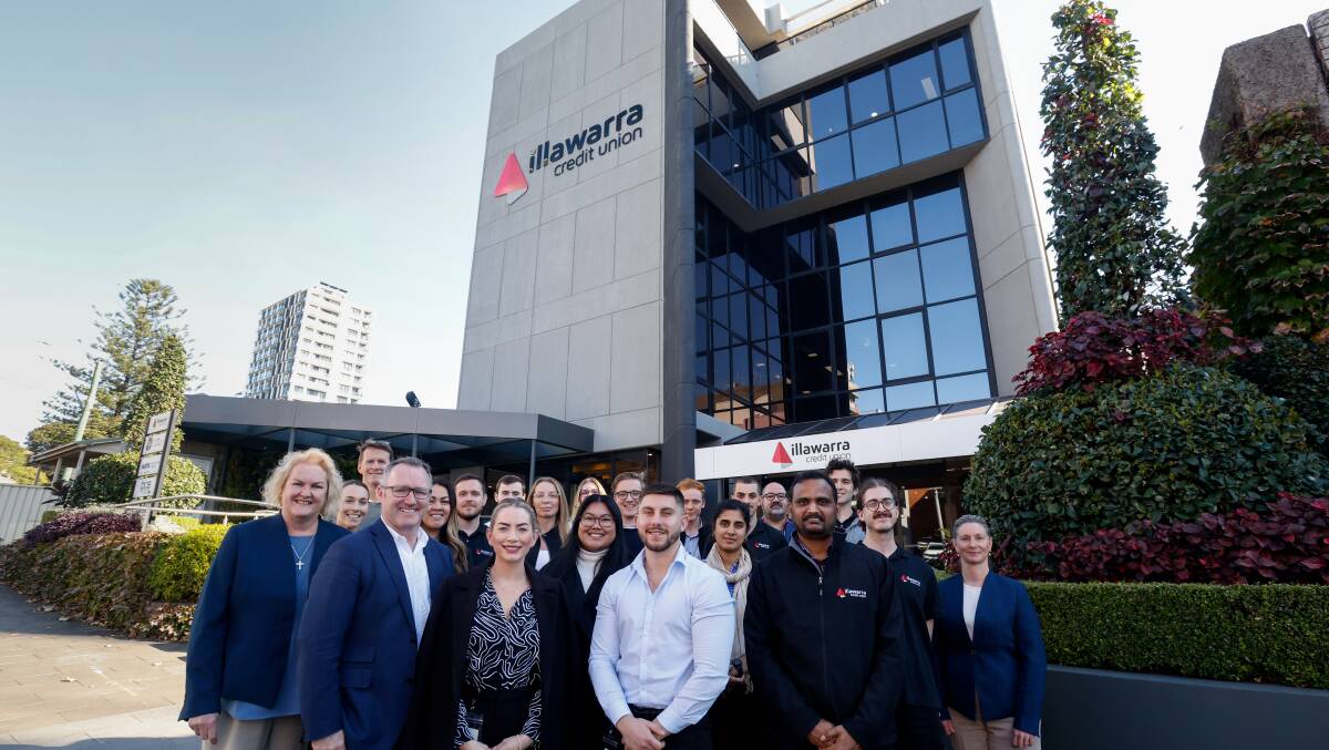Illawarra Credit Union staff with CEO Anthony Perkiss (second from left at front). The customer-owned bank has announced its intention to merge with another credit union. Picture by Anna Warr