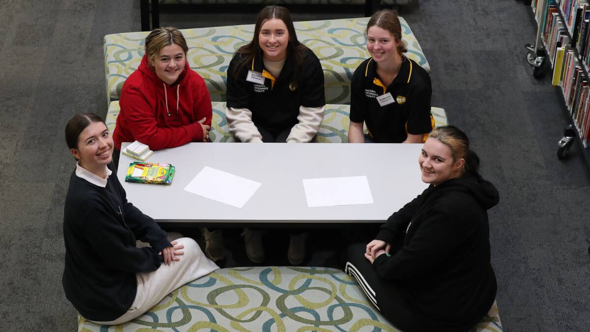 Apprenticeships: From left, Dapto High students Tayla Ringk and Lilly Gatt with first year apprentices Danica Thomas and Madison Callaway and student Shannaya Doyle at Dapto High School. Picture: Robert Peet