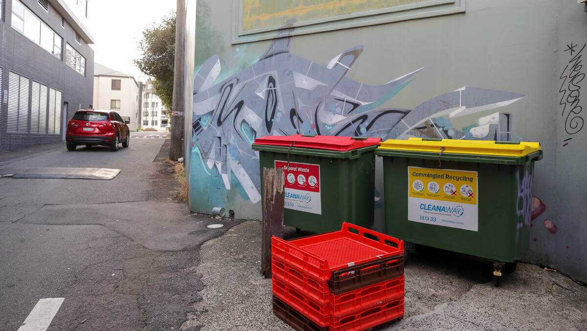 Garbage bins around the city were left full after workers took strike action. picture by Adam McLean