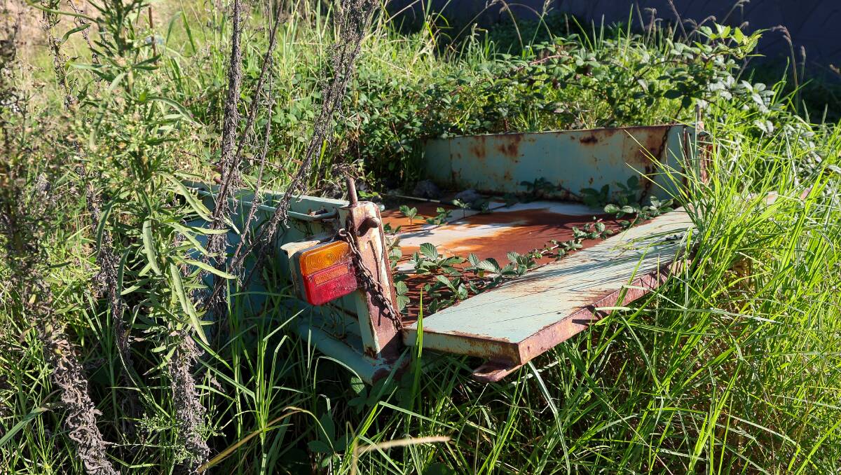 A trailer that has been left to rust in the lot. Picture by Adam McLean
