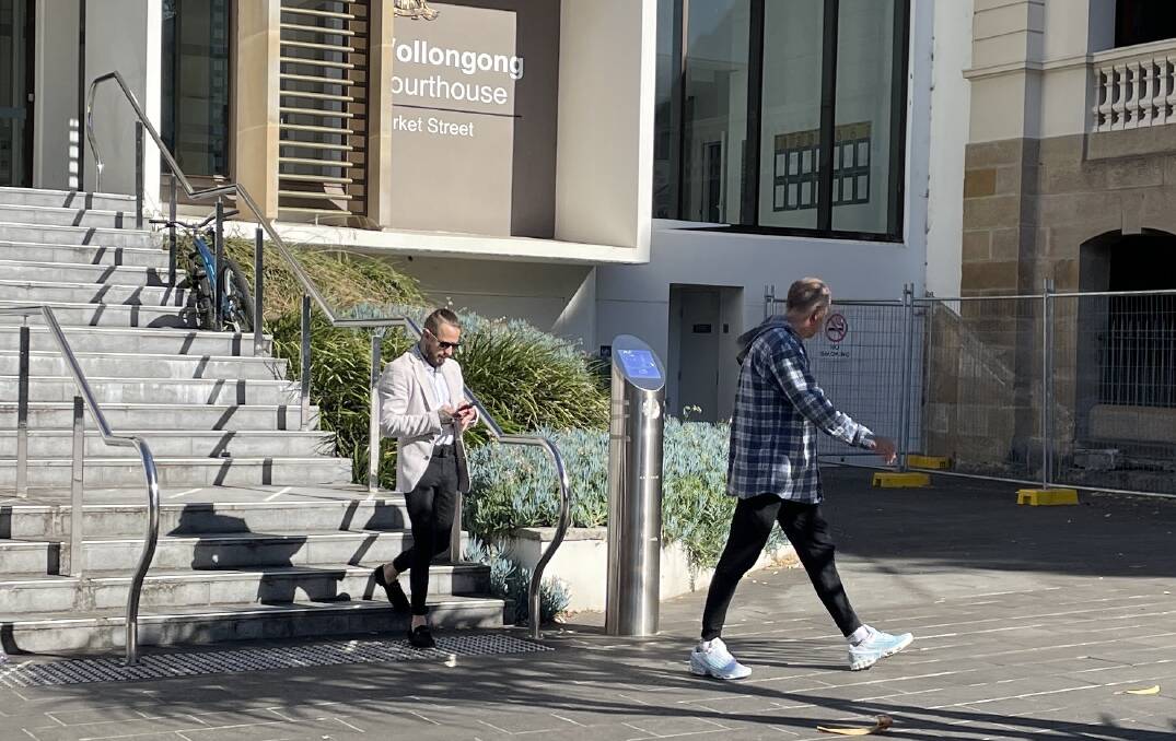 Mitchell Rath (left) leaves Wollongong Courthouse. Picture by ACM