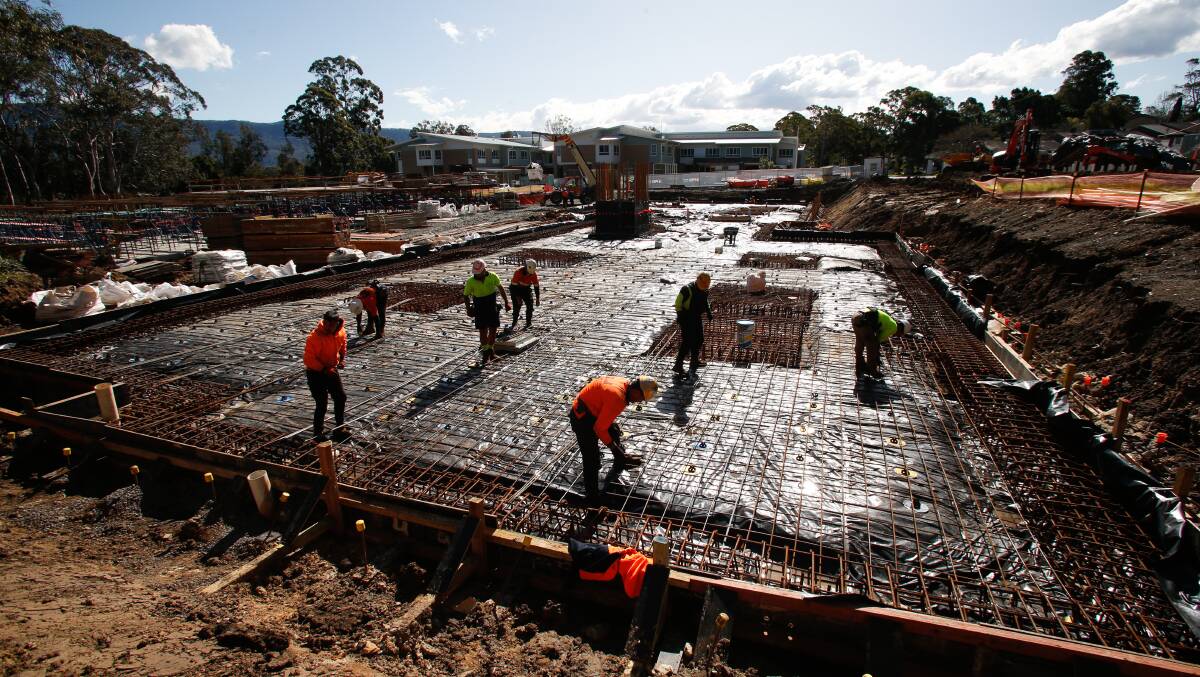 Work stopped on Friday at a social housing project in Dapto as builder PBS Building is the latest victim of the crisis in the building sector. Picture by Anna Warr