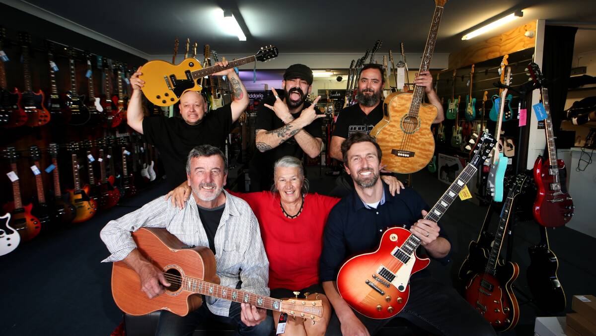 Phil, Silvana and Glenn Haworth with Haworth Guitars team members Dan Southern, Elija Quintal and Joel Robinson. The business has now been sold. Picture by Sylvia Liber