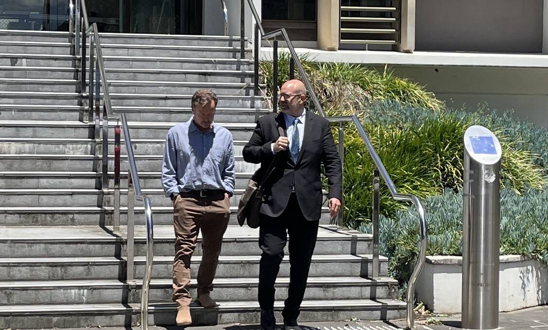 Stephen De Jong (left) leaves Wollongong courthouse after being convicted of assaulting a teenage boy.