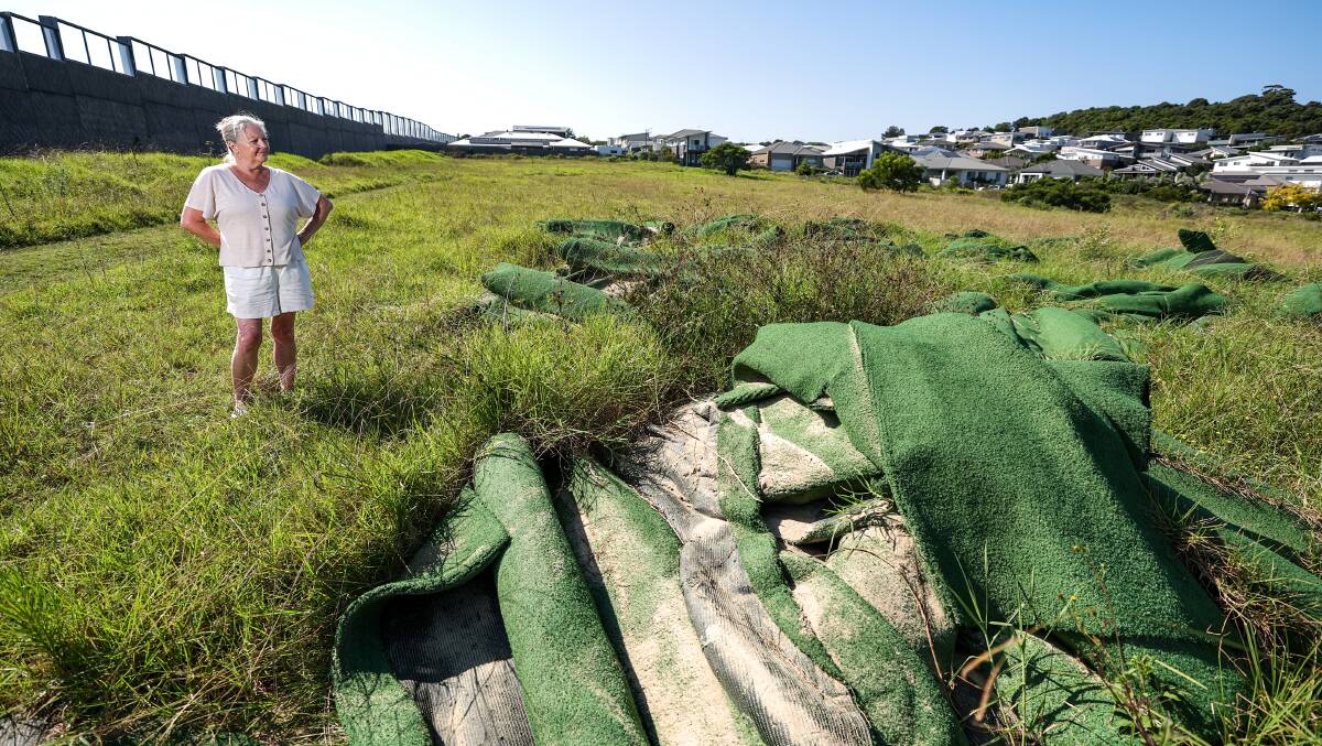 Kerrieanne Murphy said she's fed up with the dumping in a vacant lot adjacent to The Links Shell Cove. Picture by Adam McLean
