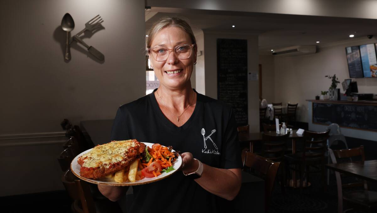 Keah Hidasi of Keah's Kitchen with the Illawarra's favourite parmi. Picture by Sylvia Liber