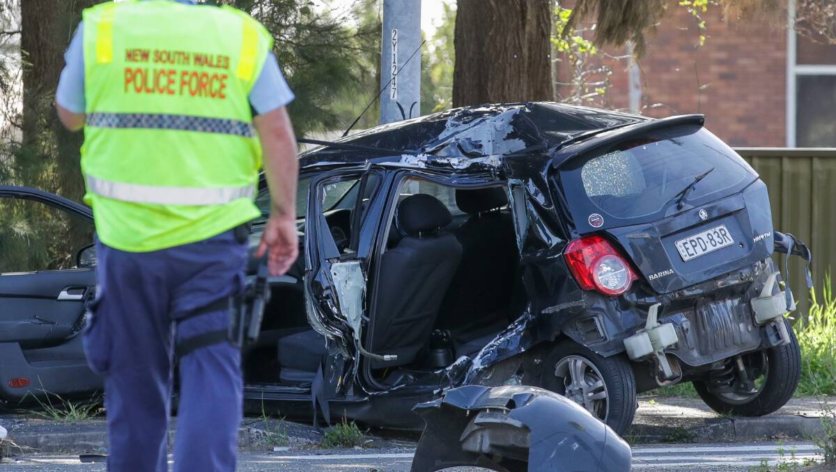 The mangled Holden Barina in which three boys were travelling when the driver lost control and crashed, killing one. Picture by Adam McLean