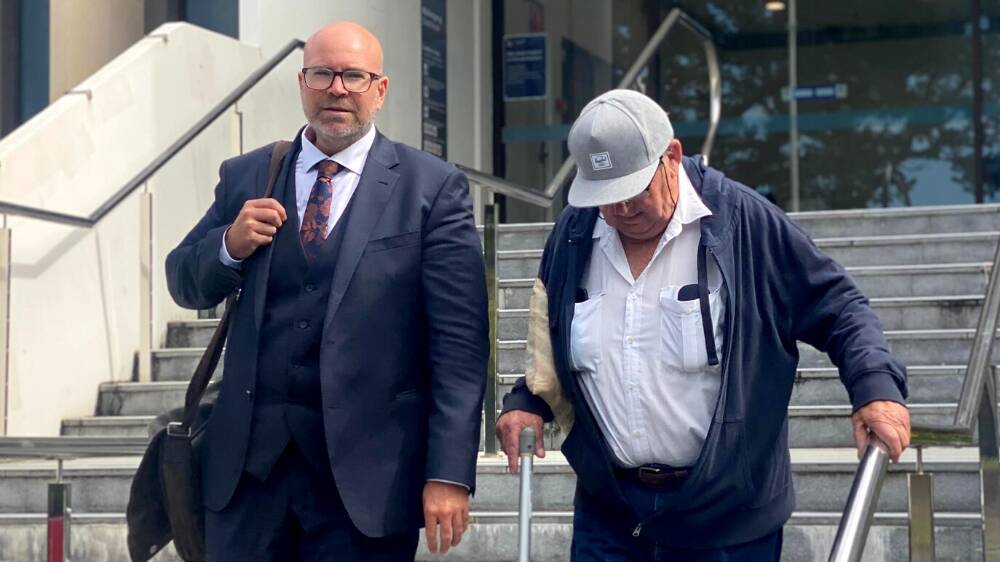 Kenneth MacDonald (right) leaves Wollongong courthouse after an earlier court appearance with defence lawyer Patrick Schmidt. Picture by ACM