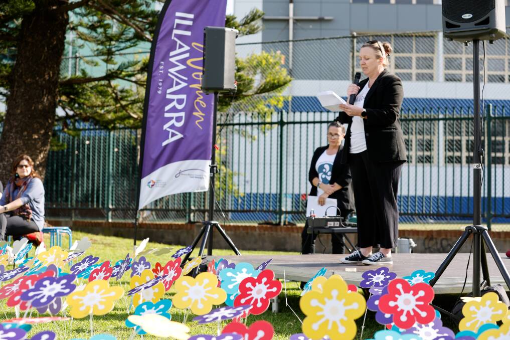 General manager of Women Illawarra Michelle Glasgow speaking to the crowd on Saturday. Picture by Anna Warr