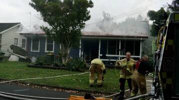 Firefighters responding to the fire at Orana Avenue, Kiama on Sunday, January 28. Picture by Connor Lambert
