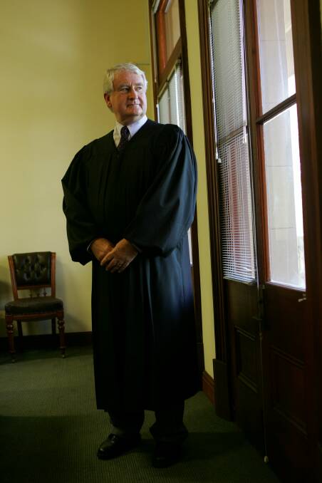 Retiring magistrate Chris McRobert photographed inside Wollongong courthouse in 2005 for an Illawarra Mercury story about the introduction of magistrates wearing robes. Picture by Kirk Gilmour
