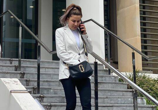 Owner of Tobacco Land, Takia Tabet, leaving Wollongong courthouse after pleading guilty to selling e-cigarettes to teens. Picture by ACM