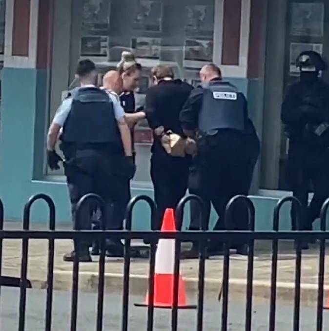 Simon Fleming being arrested after the hour-long siege. Picture from file.