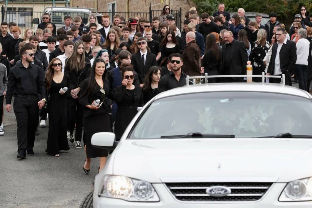 The crowd formed a guard of honour that stretched from the church to Bridge Street to bid Tyrese Bechard farewell one last time. Picture by Adam McLean.