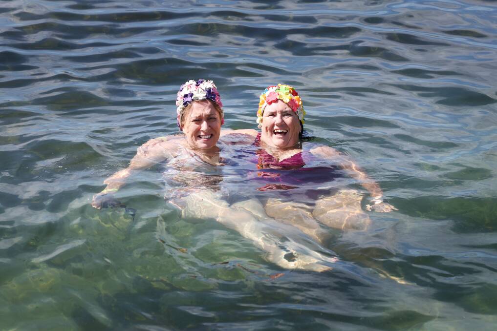Karen Cassar and Cathy Sperring floating at Austinmer ocean pool on March 3. Picture by Sylvia Liber