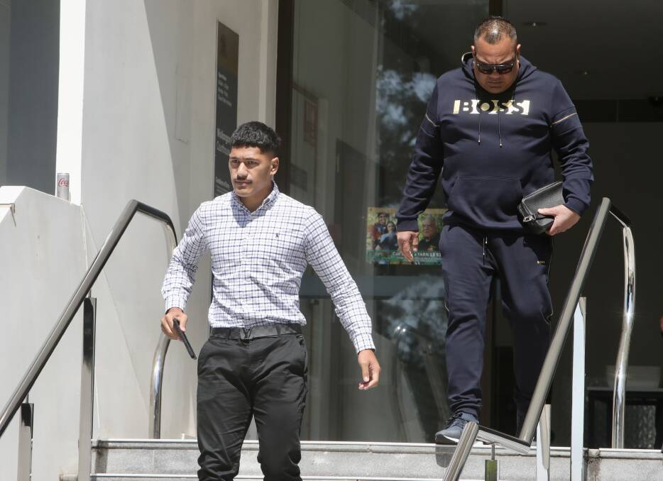 Junior and Talatau Amone leaving Wollongong Local Court yesterday. Picture by ACM.