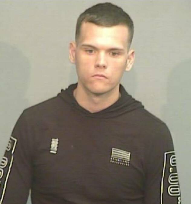 Brendan Puckeridge's mug shot that was released after a warrant was issue for his arrest. Picture from NSWPF