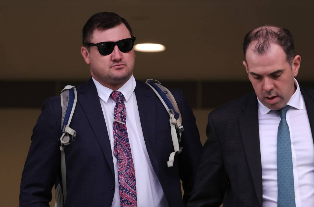 Keith William Eshman leaving Wollongong courthouse with his lawyer Robert Candelori last week. Picture by ACM