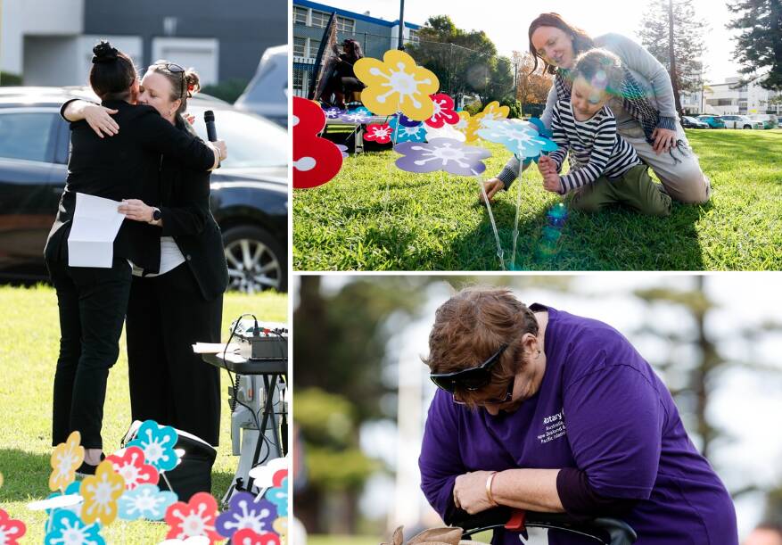 People at Lang Park on Saturday to honour women's and children's lives cut short by domestic and family violence. Picture by Anna Warr.