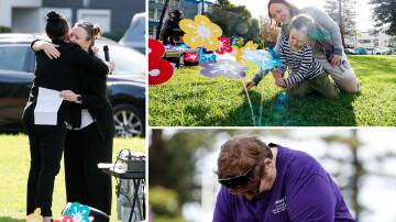 People at Lang Park on Saturday to honour women's and children's lives cut short by domestic and family violence. Picture by Anna Warr.