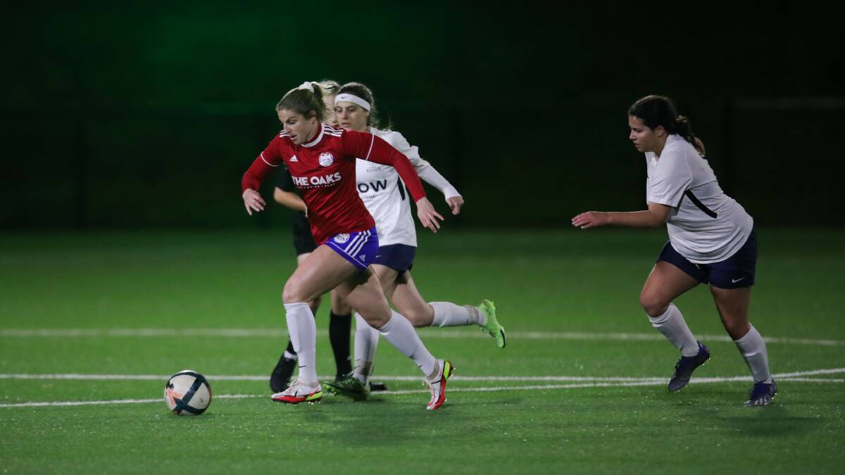 White Eagles number 10 Lucy Crighton on the ball during the side's narrow loss to University in the Women's Division One grand final last week at Ian McLennan Park. Picture by Sylvia Liber