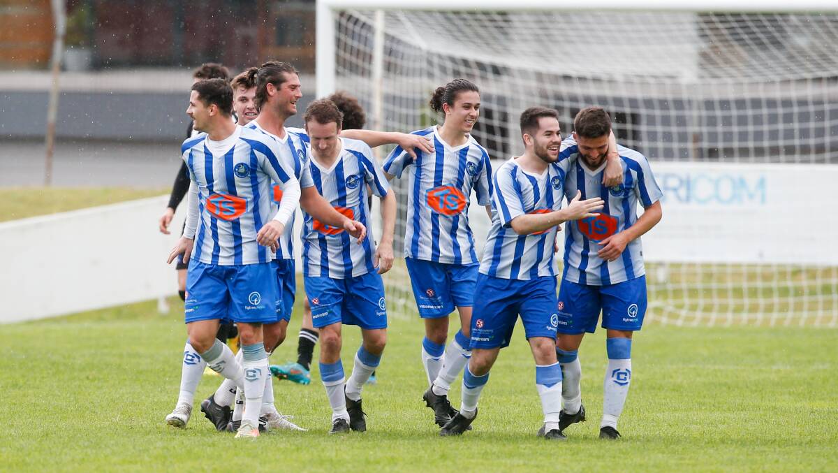 The Tarrawanna squad celebrate one of their goals in a 3-1 win against Port Kembla at Wetherall Park last season. Picture by Anna Warr