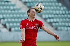 Lachlan Scott scored a late equaliser the Wolves 2-2 draw against Blacktown City at WIN Stadium. Picture by Anna Warr