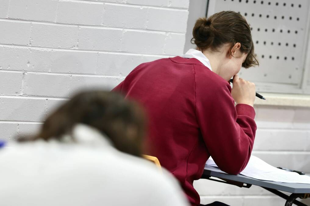 A senior Bulli High School student completes their HSC English paper one on October 11. Picture by Adam McLean