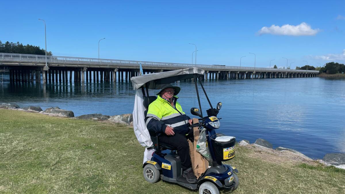 Scooter Dave sitting on his mobility scooter at Windang Bridge. Picture supplied by Marine Rescue NSW