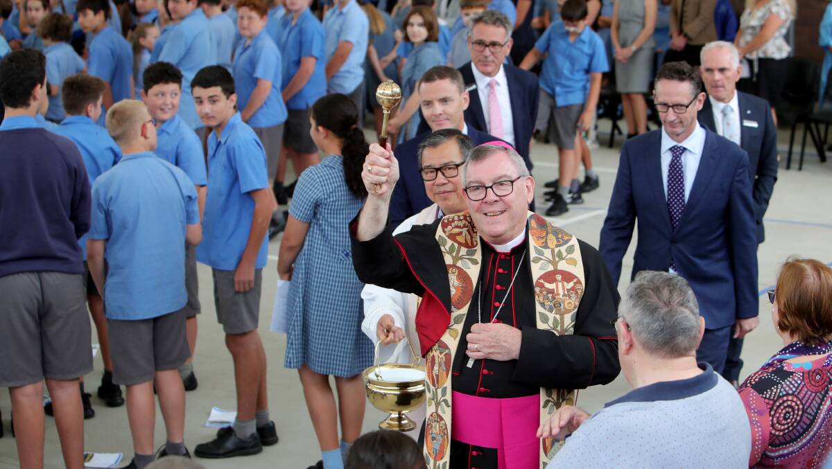 Bishop of Wollongong Brian Mascord blessed the school buildings at St John's Catholic Parish Primary School on November 21, 2023 with Father Francis Tran.
