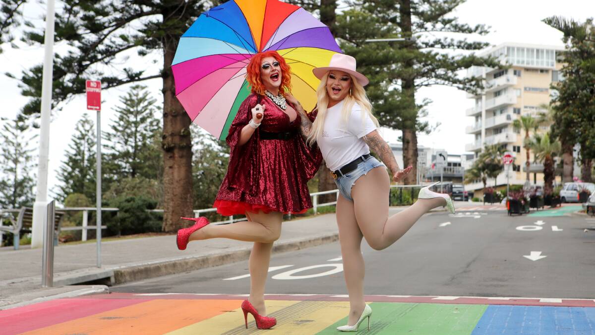 Drag Queens Roxee Horror (left) and Ellawarra (right) are embracing the rainbow ahead of the Mardi Gras Parade. 