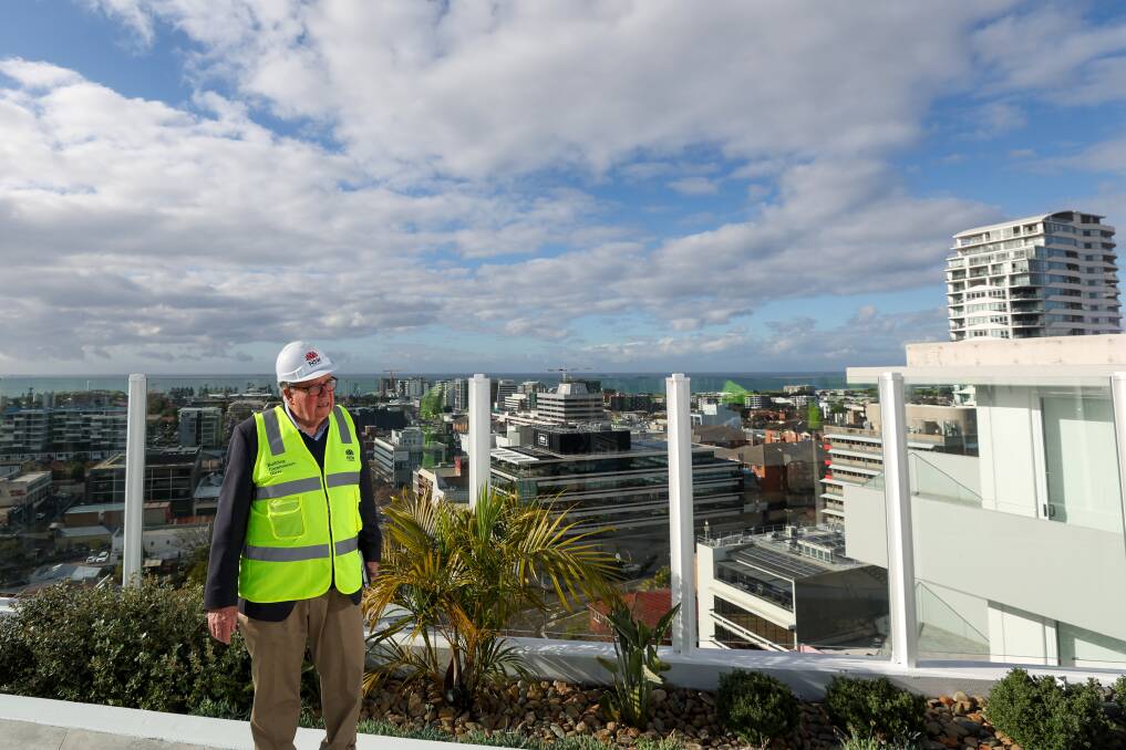 NSW Building Commissioner David Chandler on the roof at Novello in Young Street, Wollongong. He was impressed with the quality of the basement, a location he saw as "the DNA" of a building. Picture by Adam McLean
