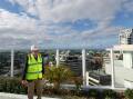 NSW Building Commissioner David Chandler on the roof at Novello in Young Street, Wollongong. He was impressed with the quality of the basement, a location he saw as "the DNA" of a building. Picture by Adam McLean