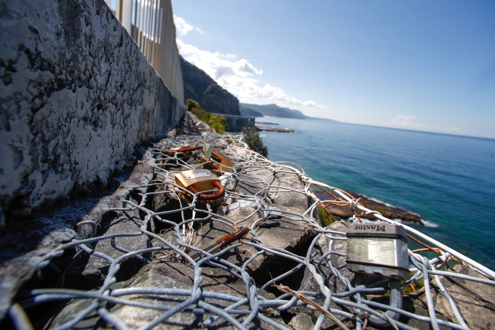Roads and Maritime Services plans to remove these and other love locks from the Sea Cliff Bridge and approaches next month. Picture: Adam McLean