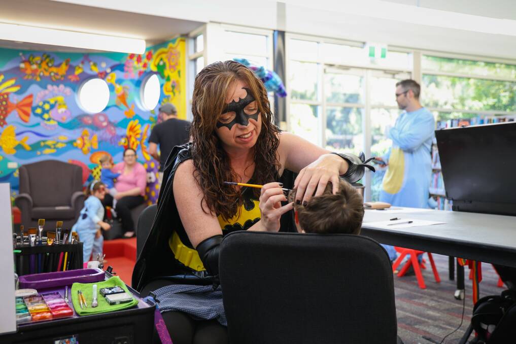 Face-painting was just part of the fun at Saturday's Comic Gong family cosplay day at Corrimal Library. Picture by Wesley Lonergan