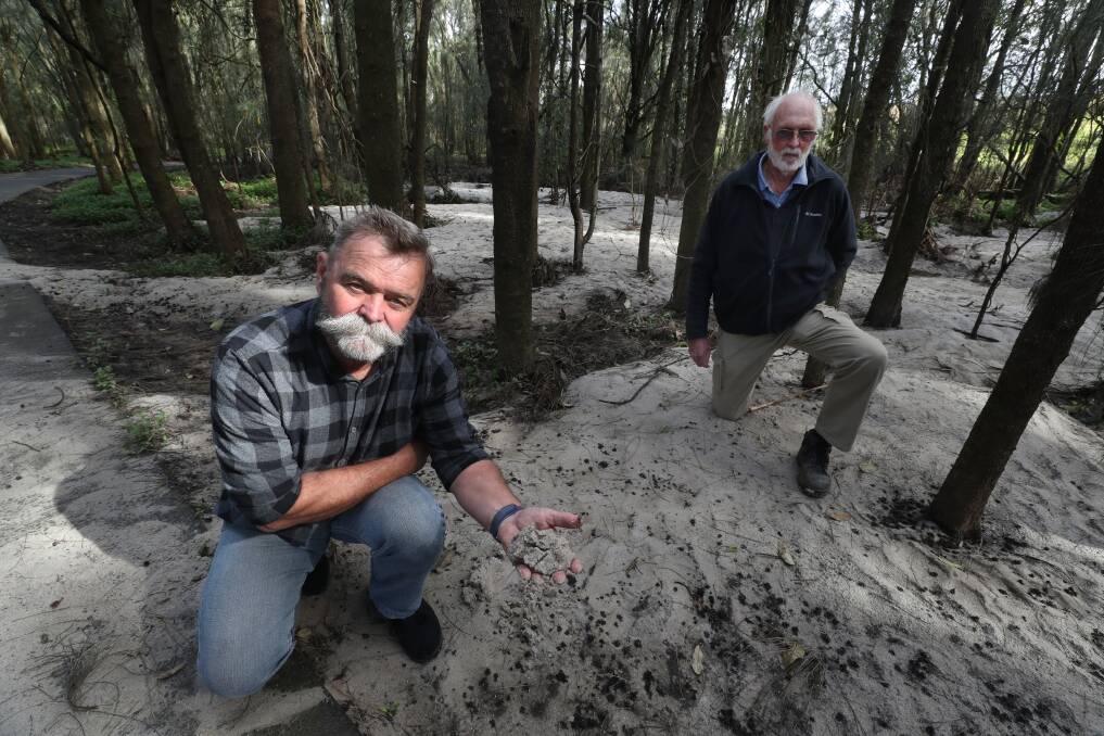 Friends of Minnamurra River chair Will Chyra (left) had claimed Kiama Council is spending $40,000 to restore a recently-bulldozed forest. But council said the group has got their location all wrong. Picture by Robert Peet
