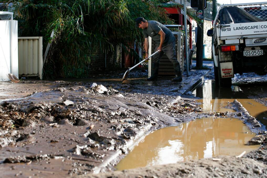The clean-up at Austinmer after the April floods ... Wollongong could see more damage like this if the city council can't get funding to upgrade stormwater infrastructure. Picture by Glen Humphries