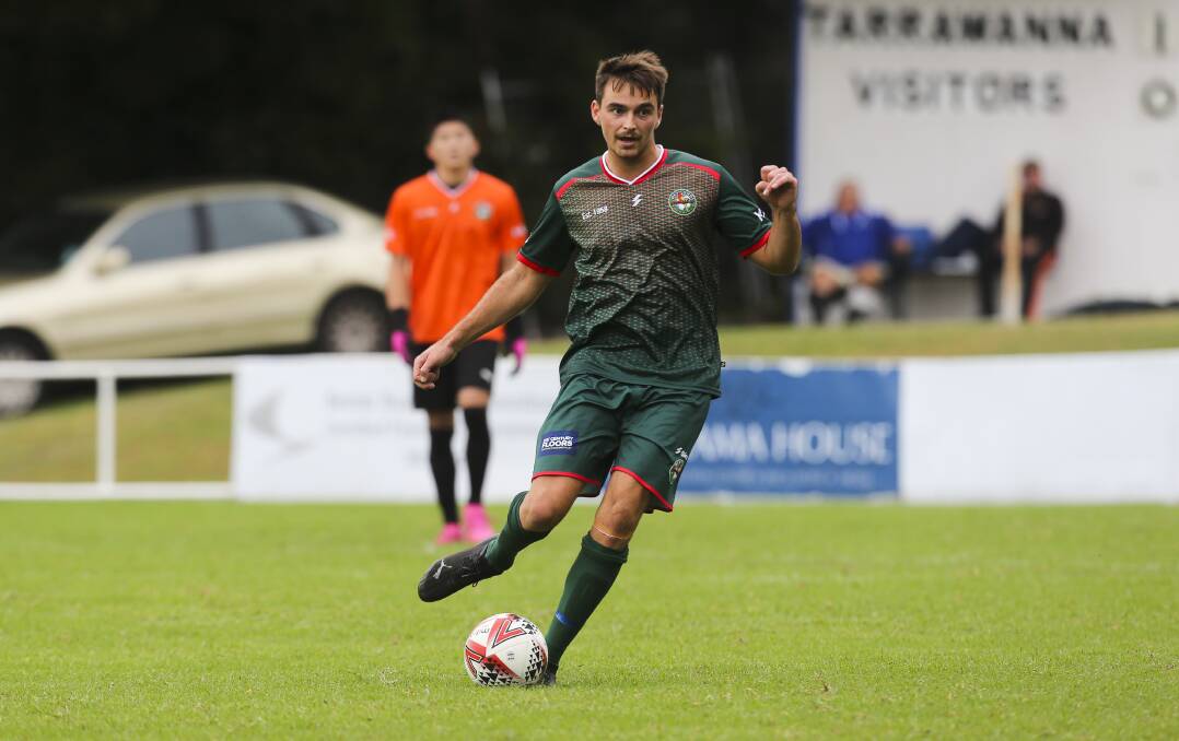 MOVING FORWARD: Bellambi player Johnny Vicoroski prepares to pass the ball during an Illawarra Premier League game this year. Picture: Anna Warr