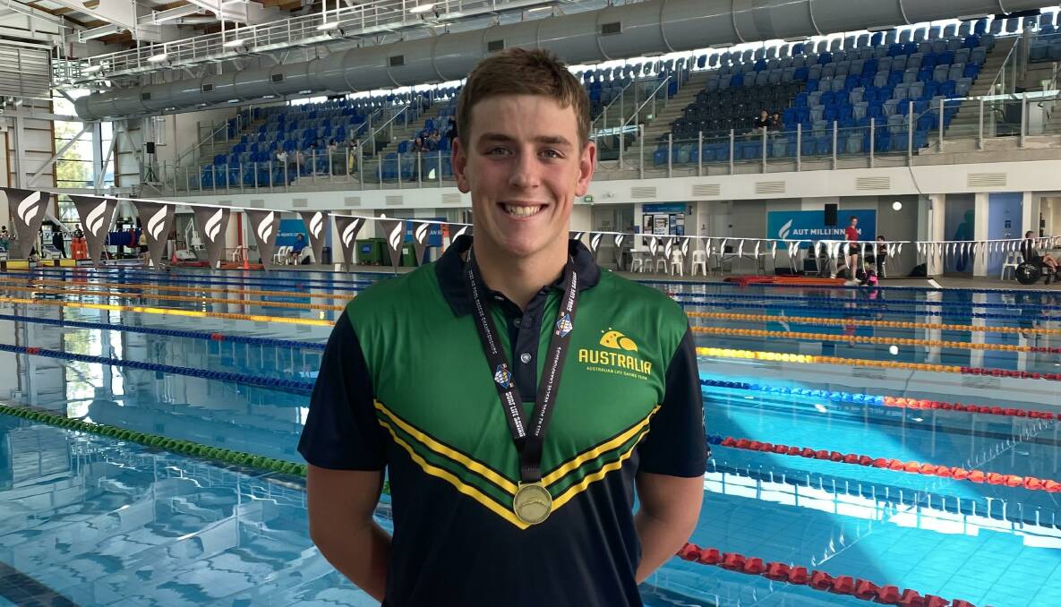 Corrimal teenager Brayden Woodford with one of the medals that he secured at the New Zealand Pool Rescue Championships. Picture - Supplied