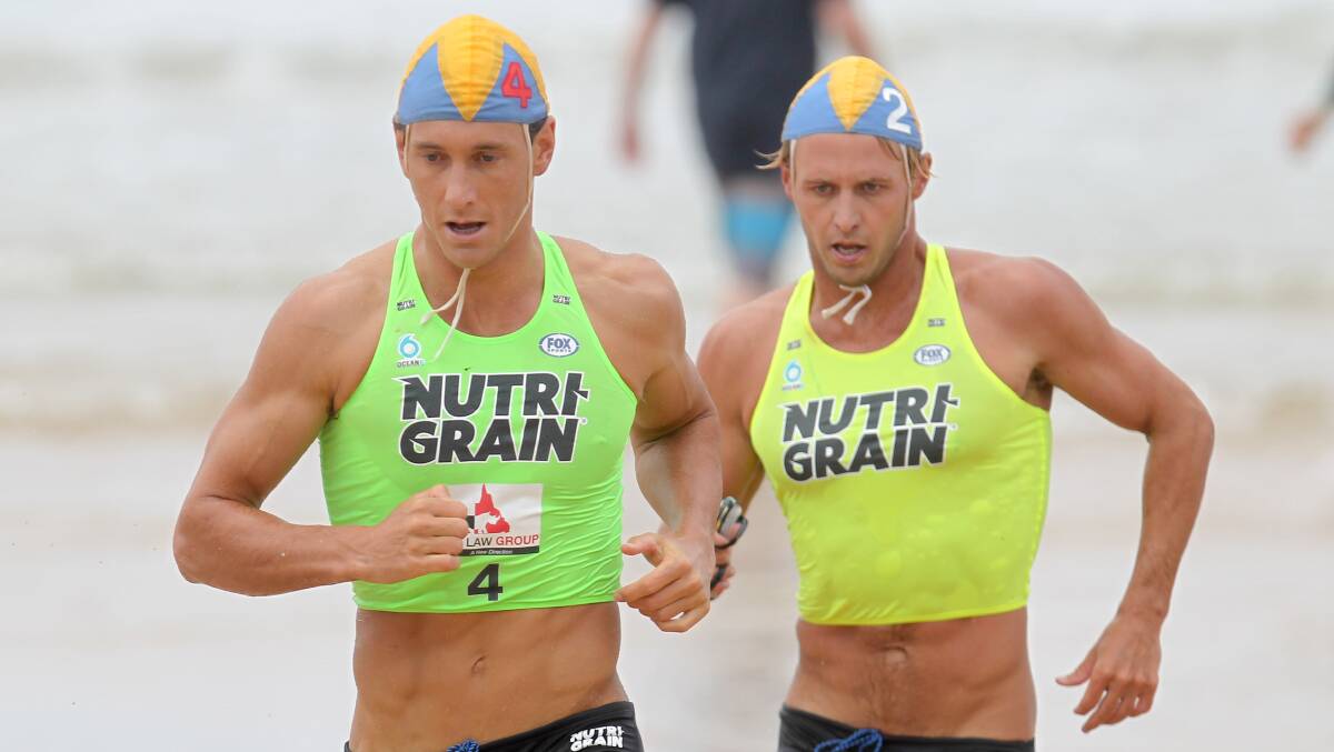 Ali Day (left) competing at a Nutri-Grain Ironman series event at North Wollongong Beach in December 2017. Picture by Adam McLean