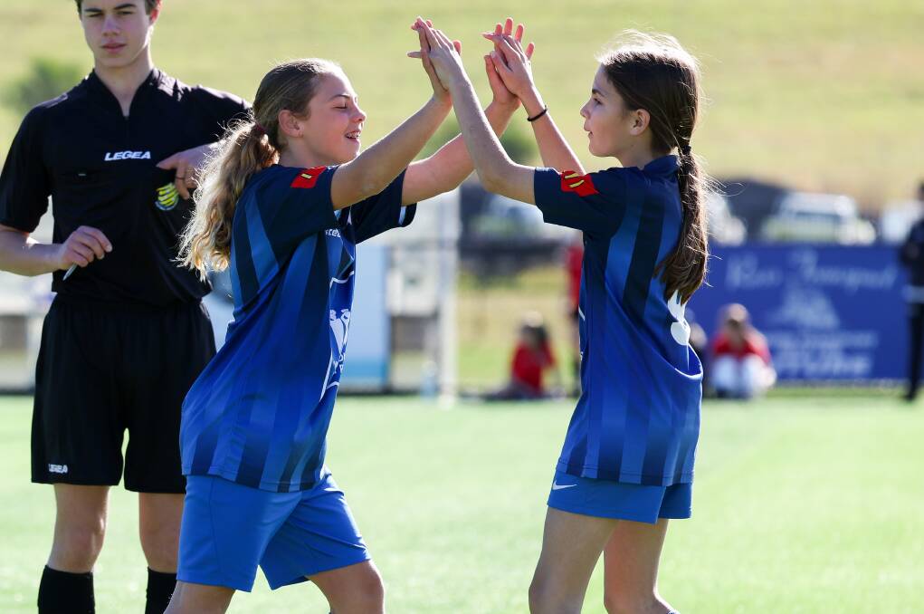 All of the action from the Mini World Cup for U/12 and U/13 girls run by Football South Coast at Ian McLennan Park on Thursday. Pictures by Adam McLean