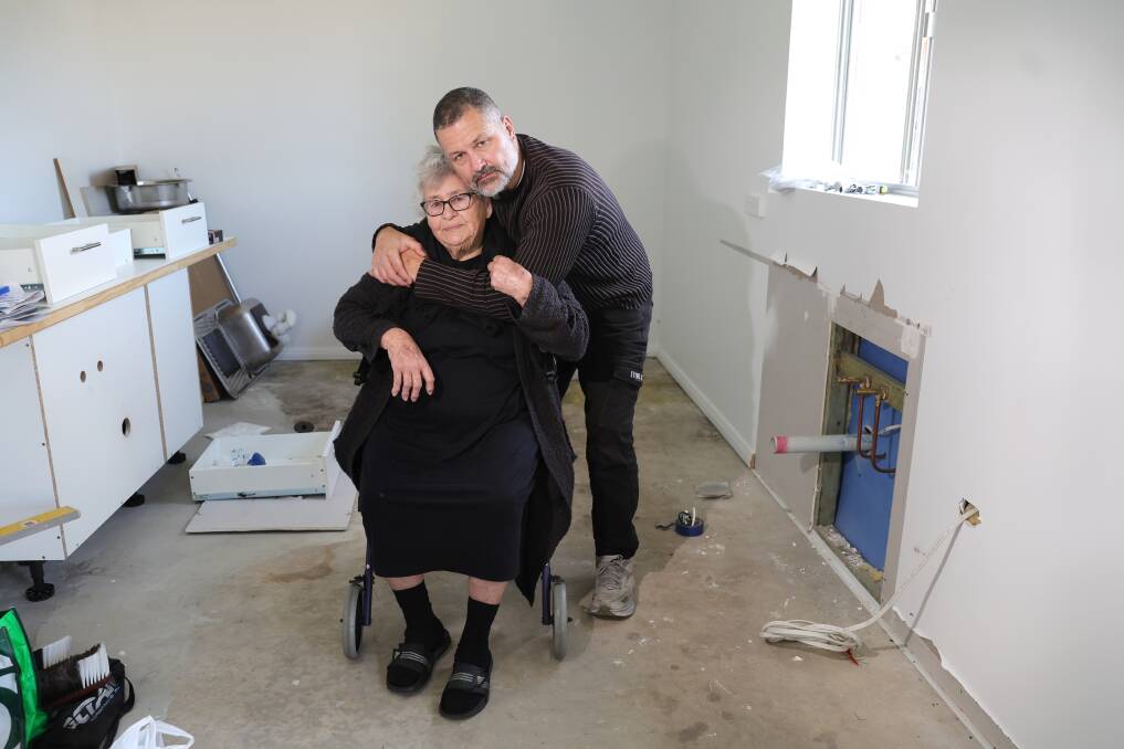 Manny Gregoris and his mother Efthalia for a follow about the dodgy granny flat. Picture by Sylvia Liber