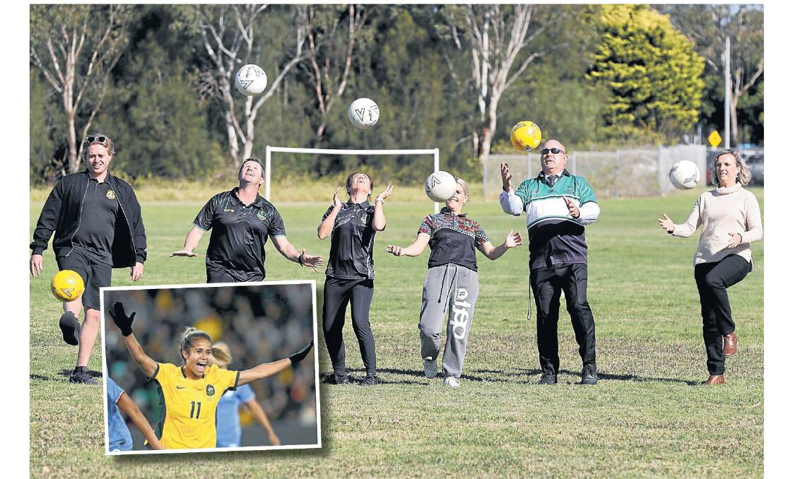 Wollongong High School of the Performing Arts staff Doug Chisholm, Bryce O'Connor, Michelle Carney, Erika Lampe, Paul Ryan and Fleur Williams celebrate Matilda and former student Mary Fowler the only way they know how - with a football. Picture by Robert Peet