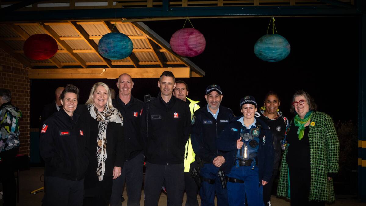 Organisers, FRNSW representatives and NSW Police celebrate the 2023 Port Kembla Lantern Parade. Picture by Kelly Ryan.