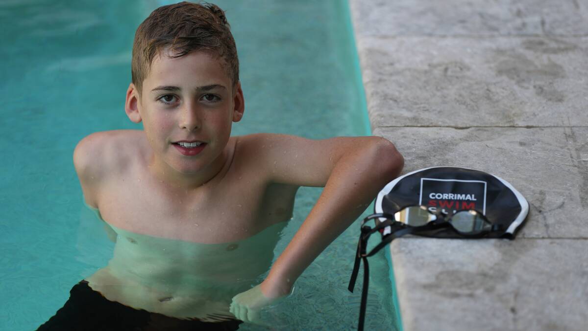 Bulli 10-year-old Nash Hawkins has been a state representative for Corrimal Swim Club twice this year, thanks to help from his beloved coach Tracey Waters. Picture by Robert Peet