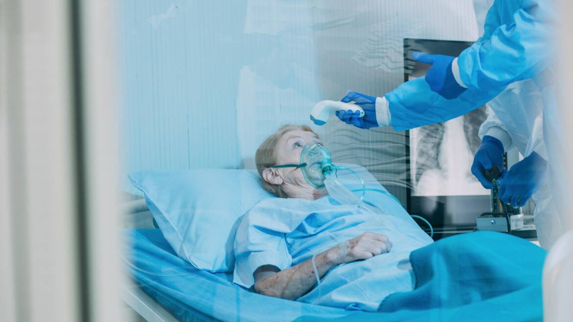 A file picture of an older woman in hospital. 